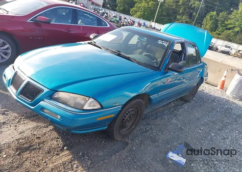 1995 Pontiac Grand Am Se z USA, uszkodzony, nr VIN 1G2NE55M7SC714410